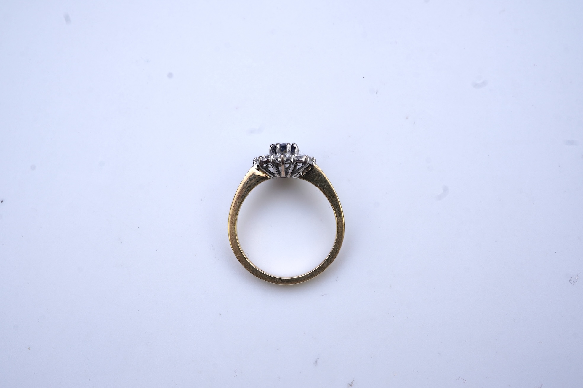 A sapphire and diamond cluster ring